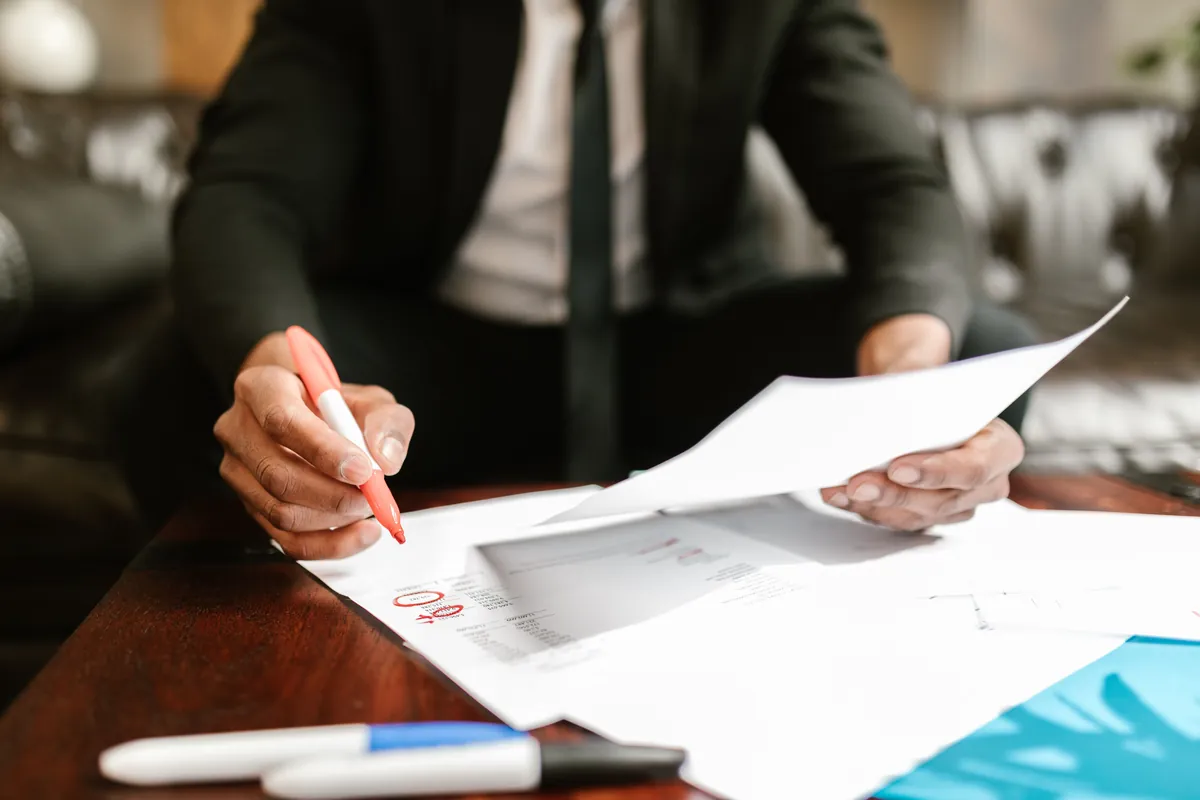 Business owner reviewing paperwork